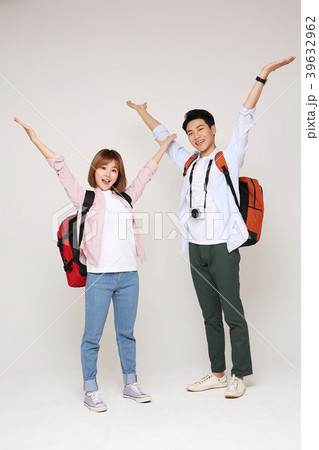 Happy young traveler couple concept photo. set out on a trip to honeymoon, camping and summer vacation concept isolated on white background. 184 Happy young traveler couple concept photo. set out on a trip to honeymoon, camping and summer vacation concept isolated on white background. 184 39632962