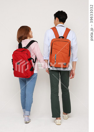 Happy young traveler couple concept photo. set out on a trip to honeymoon, camping and summer vacation concept isolated on white background. 159 Happy young traveler couple concept photo. set out on a trip to honeymoon, camping and summer vacation concept isolated on white background. 159 39633032