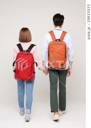 Happy young traveler couple concept photo. set out on a trip to honeymoon, camping and summer vacation concept isolated on white background. 158 Happy young traveler couple concept photo. set out on a trip to honeymoon, camping and summer vacation concept isolated on white background. 158 39633033