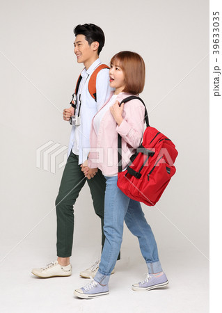 Happy young traveler couple concept photo. set out on a trip to honeymoon, camping and summer vacation concept isolated on white background. 152 Happy young traveler couple concept photo. set out on a trip to honeymoon, camping and summer vacation concept isolated on white background. 152 39633035
