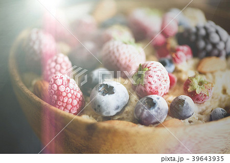 Oatmeal porridge with frozen berries, almonds in Oatmeal porridge with frozen berries, almonds in 39643935