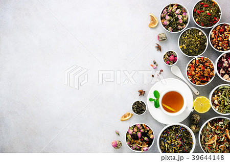 Assortment of dry tea in white bowls. Tea types 39644148