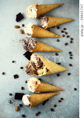 Chocolate and coffee ice cream in waffle cone with Chocolate and coffee ice cream in waffle cone with 39645747