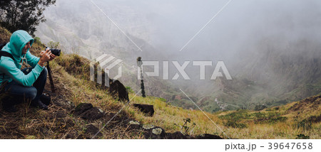 Panoramic shot of traveler making photo of amazing 39647658