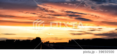 Empty asphalt road and sun rising on skyline 39650500
