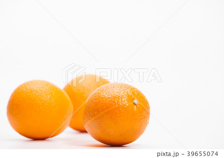 Fresh background of oranges on white 39655074
