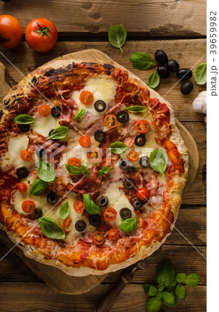 Rustic pizza with tomato, cheese, salami 39659982