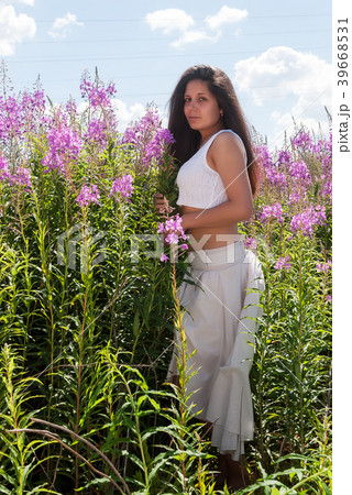 Attractive girl on meadow Attractive girl on meadow 39668531