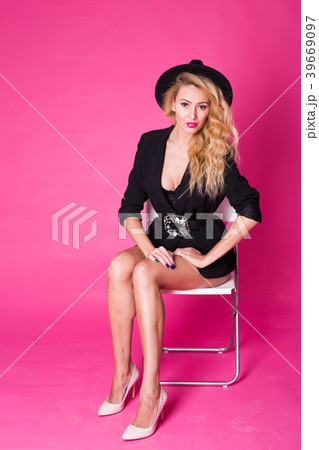 Fashion portrait of elegant young woman with curly Fashion portrait of elegant young woman with curly 39669097