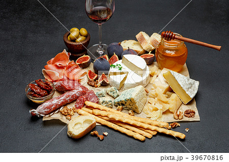various types of cheese, meat, fruits and wine various types of cheese, meat, fruits and wine 39670816
