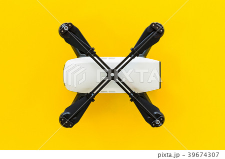 Small white planes on a yellow background. Small white planes on a yellow background. 39674307