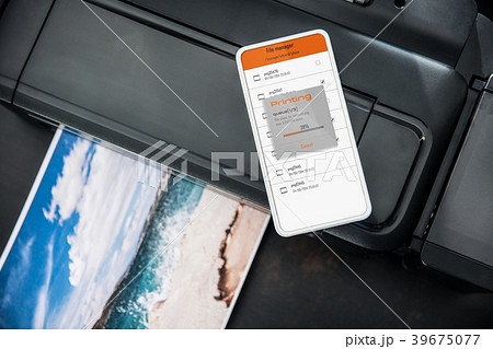 Smartphone connected with wireless photo printer Smartphone connected with wireless photo printer 39675077