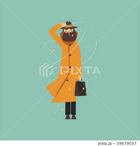 Bearded man in warm orange overcoat and hat on a 39679037