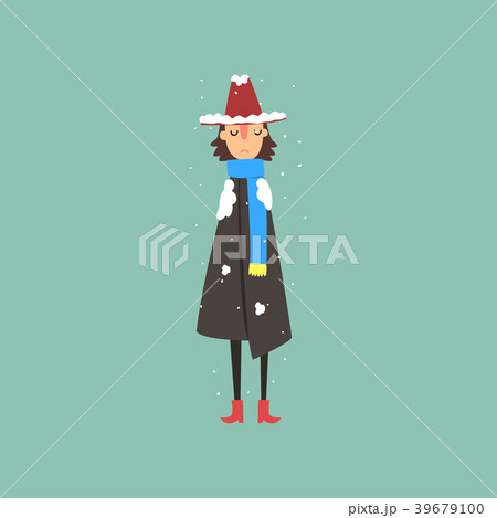 Young woman in warm coat, scarf and hat freezing 39679100