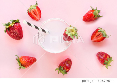 Strawberry milkshake with berry on pink. Close up. 39679811