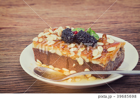 Delicious homemade toffee cake with mulberry  39685698