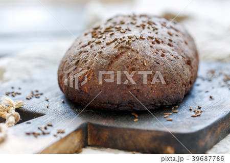 Loaf of artisan rye bread with cumin. Loaf of artisan rye bread with cumin. 39687786