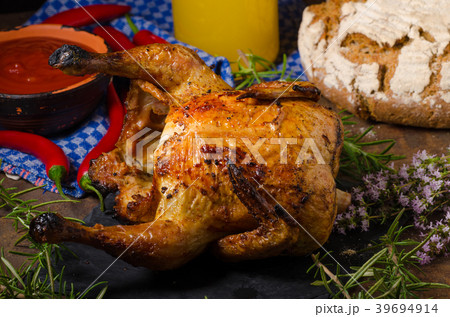 Grilled chicken on a can of beer Grilled chicken on a can of beer 39694914