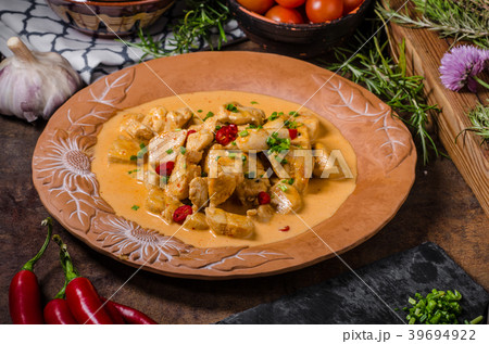 Chicken curry with herbs Chicken curry with herbs 39694922