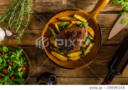 Beef steak with herbs and wine 39696168