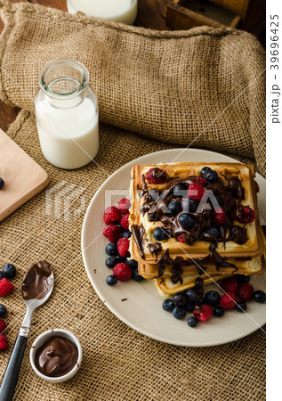 Waffles with fruits and chocolate Waffles with fruits and chocolate 39696425