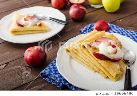 Cream pancakes with nectarines Cream pancakes with nectarines 39696490