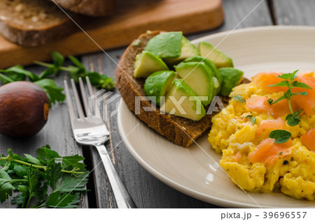 Salmon scrambled eggs and avocado toast Salmon scrambled eggs and avocado toast 39696557