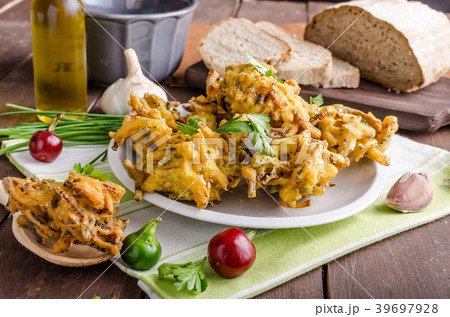 Crispy onion bhajis Crispy onion bhajis 39697928