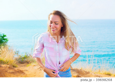portrait happy smiling blonde girl having fun 39698268