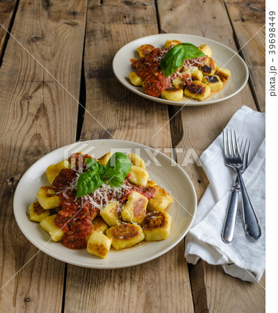 Homemade gnocchi with tomato sauce 39698449
