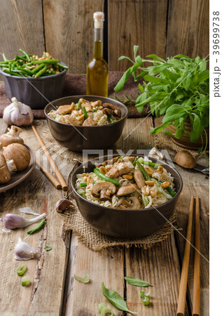 Chinese noodles with brown mushrooms 39699738