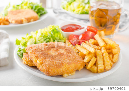 Fried cheese with french fries and lettuce Fried cheese with french fries and lettuce 39700401