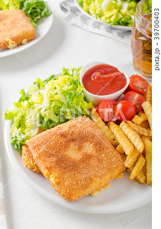 Fried cheese with french fries and lettuce 39700403