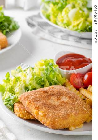 Fried cheese with french fries and lettuce Fried cheese with french fries and lettuce 39700405