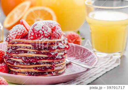 Pancakes strawberry, sugar and jam 39701717