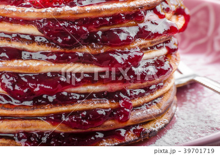Pancakes strawberry, sugar and jam 39701719