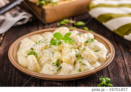 Cheese gnocchi with blue cheese sauce and galic 39701857
