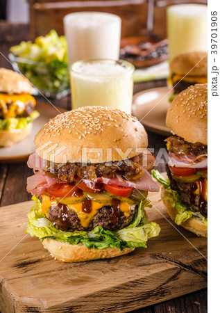 Homemade beef burger, caramelized onion, bacon and beer 39701906