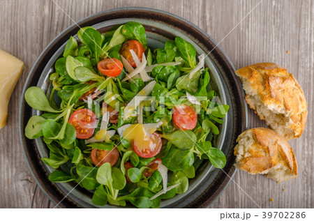 Lamb lettuce salad with dijon dressing Lamb lettuce salad with dijon dressing 39702286