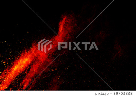 Redrange color powder explosion on background. Redrange color powder explosion on background. 39703838