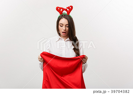 Christmas Concept - Young beautiful business woman 39704382