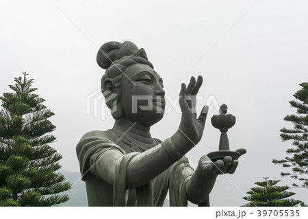 Buddhist statue making offerings Hong Kong 39705535