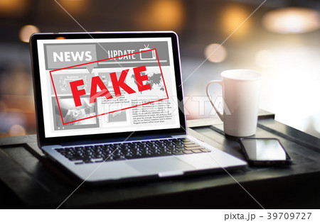 Fake news concept man reading news media  Fake news concept man reading news media  39709727