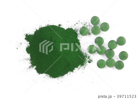 Spirulina algae powder and pills isolated on white Spirulina algae powder and pills isolated on white 39711523