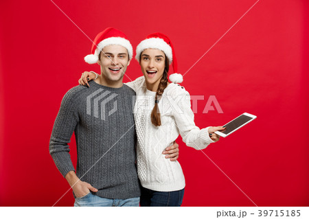 Christmas concept - Happy young couple in 39715185