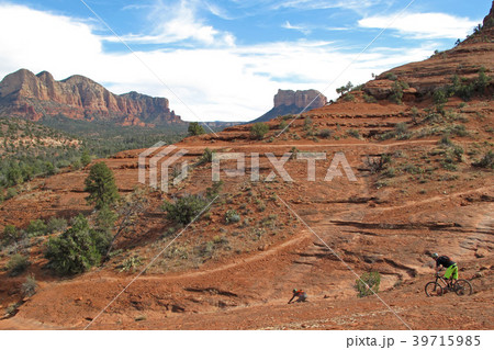 Mountain biker in the red rocks, Sedona, USA Mountain biker in the red rocks, Sedona, USA 39715985
