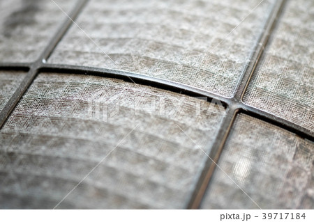 Many dirty dust on the air filter wall 39717184