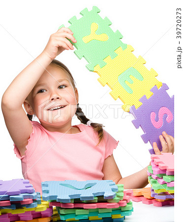 Cute little girl is holding Yes slogan Cute little girl is holding Yes slogan 39720273