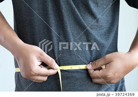 man Checking Waistline body shape waist man Checking Waistline body shape waist 39724369