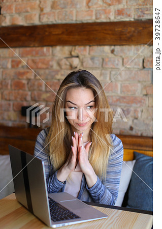 Beautiful female person resting at cafe with Beautiful female person resting at cafe with 39728647